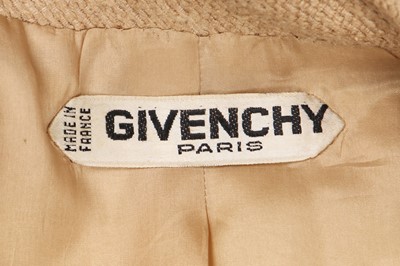Lot 359 - A Givenchy couture oatmeal tweed suit, circa 1966
