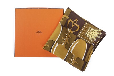 Lot 220 - A pair of Hermès yellow leather gloves and...