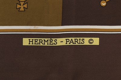 Lot 220 - A pair of Hermès yellow leather gloves and...