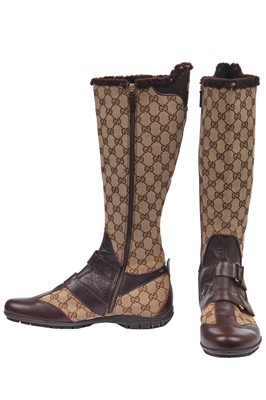 Lot 112 - A pair of Gucci monogrammed canvas boots, 2000s