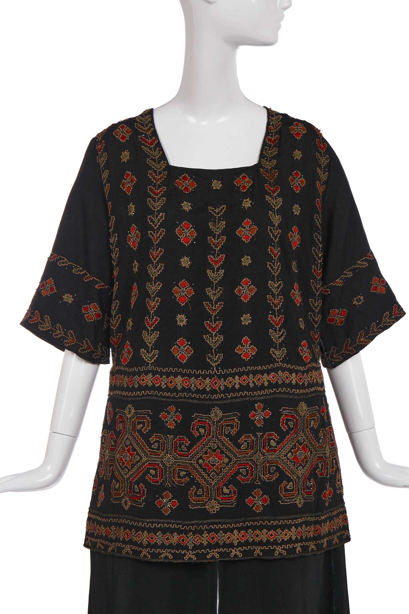 Lot 233 - A rare and important Chanel couture tunic, embroidered by Kitmir, 1922