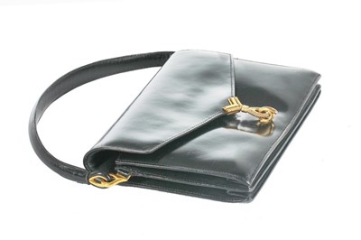 Lot 108 - An Hermès black leather handbag, late...