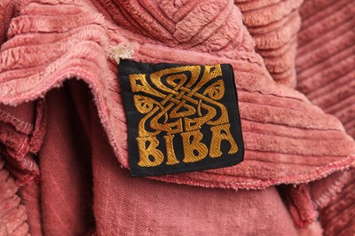 Lot 371 - A Biba pink jumbo-corduroy trench coat, 1969