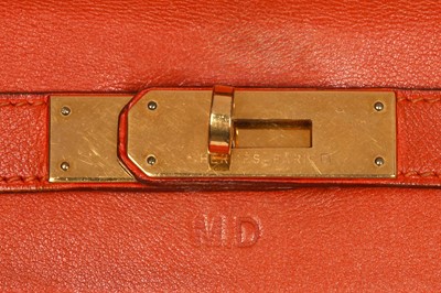 Lot 186 - A Hermès orange Swift leather Retournè Kelly 35, 1995