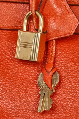 Lot 186 - A Hermès orange Swift leather Retournè Kelly 35, 1995