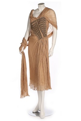 Lot 241 - An Alexander McQueen beige chiffon cocktail...