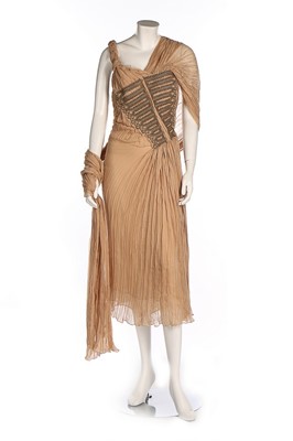 Lot 241 - An Alexander McQueen beige chiffon cocktail...