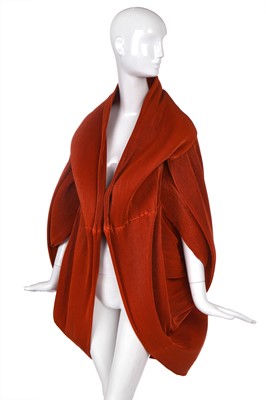 Lot 538 - An Issey Miyake orange pleated polyester jacket, Autumn/Winter 2009/10