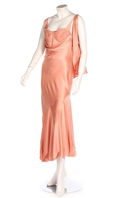 Lot 243 - An Alexander McQueen bias-cut pink satin gown,...