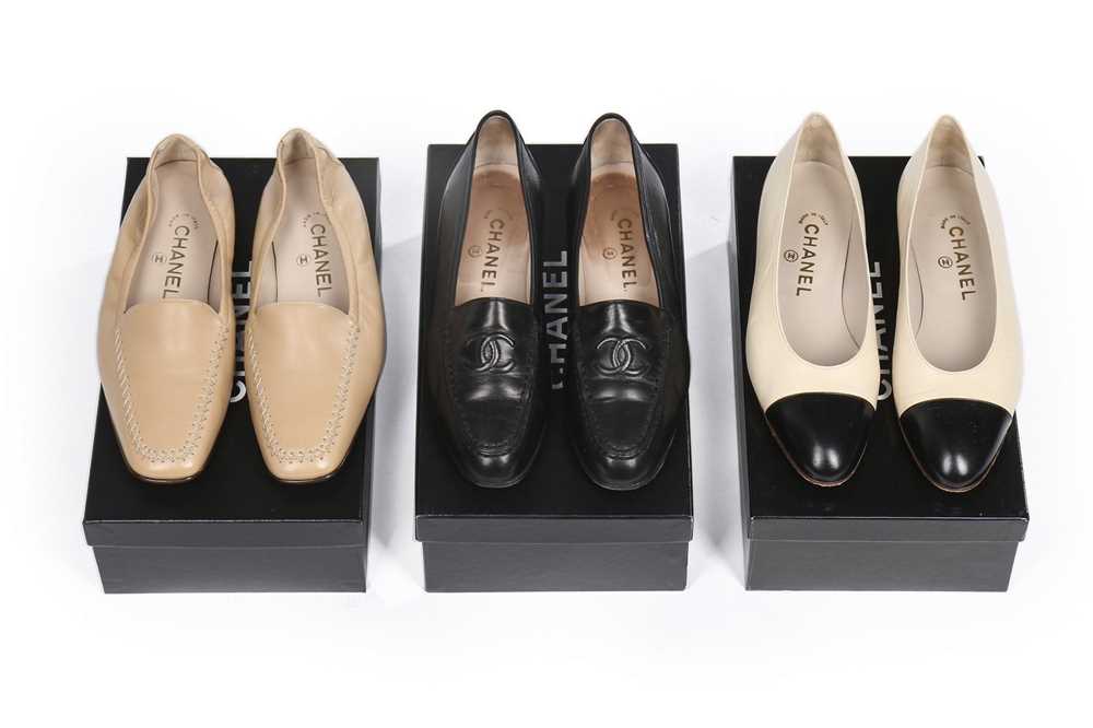 Lot 18 - Three pairs of Chanel shoes, modern, stamped...