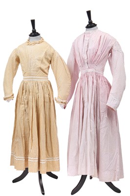 Lot 516 - Three girl/adolescent printed cotton summer dresses, early 1860s