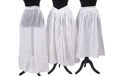 Lot 516 - Three girl/adolescent printed cotton summer dresses, early 1860s