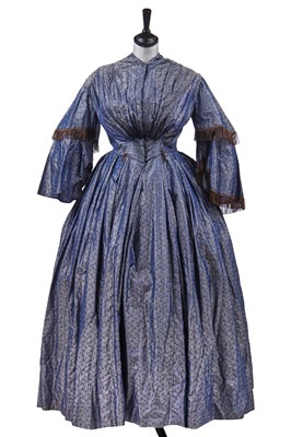 Lot 517 - A changeant-silk brocaded dress, circa 1855