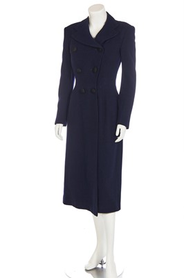 Lot 381 - A Marcel Rochas couture navy wool double-breasted coat, early 1950s