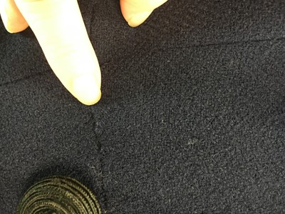 Lot 381 - A Marcel Rochas couture navy wool double-breasted coat, early 1950s