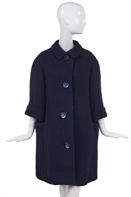 Lot 258 - A Christian Dior couture navy bouclé wool coat, 1950s