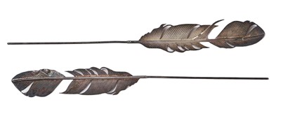 Lot 439 - A pair of rare Slim Barrett for John Galliano metal feather ornaments, 'Dolores' collection, Autumn-Winter 1995-96