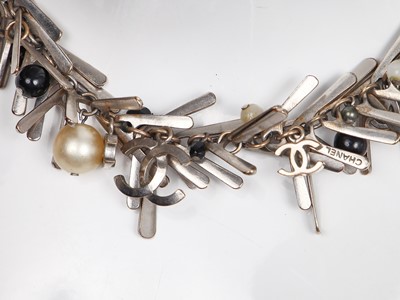 Lot 183 - A Chanel silver-plated charm necklace, Spring-Summer 2006
