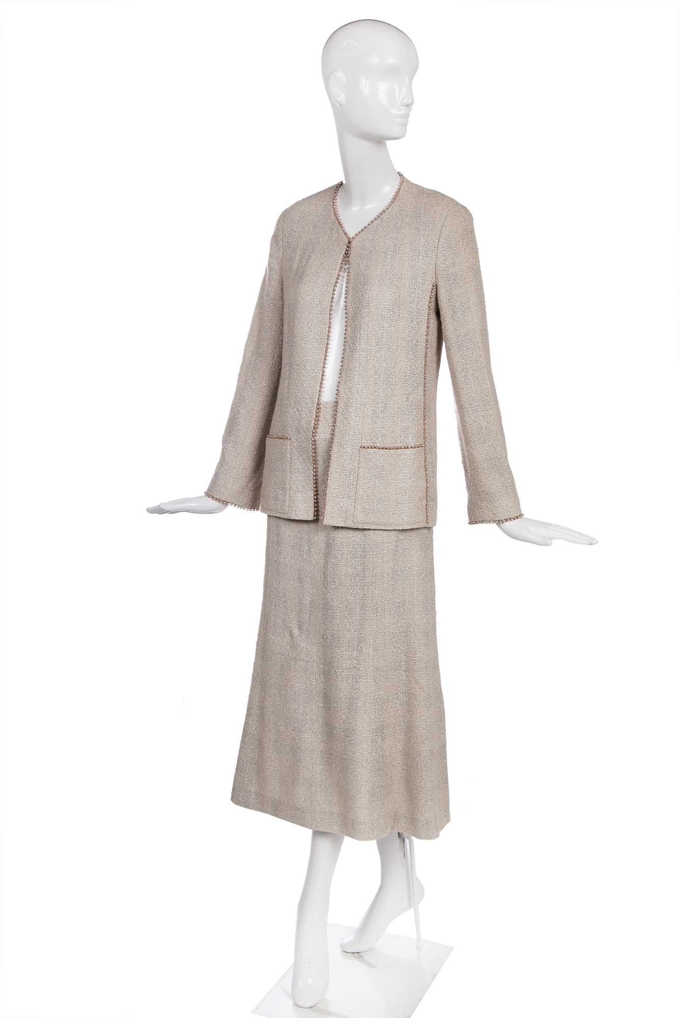 Lot 179 - A Chanel buff-coloured bouclé cotton suit, Spring-Summer 1999