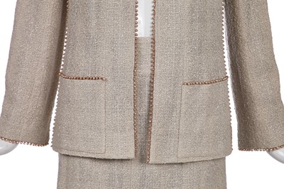 Lot 179 - A Chanel buff-coloured bouclé cotton suit, Spring-Summer 1999