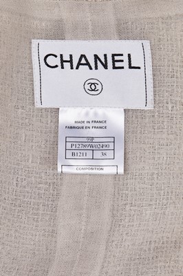 Lot 179 - A Chanel buff-coloured bouclé cotton suit, Spring-Summer 1999
