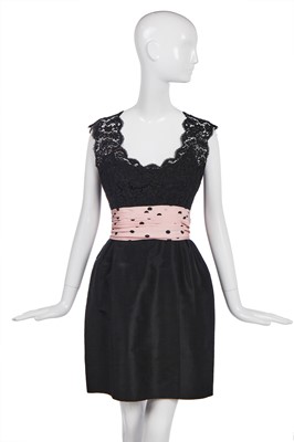 Lot 181 - A Chanel little black dress with polka-dot pink faille cummerbund, Spring-Summer 1988