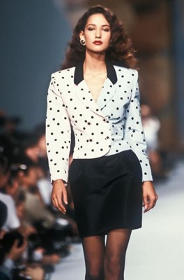 Lot 2 - A Chanel little black dress with polka-dot pink faille cummerbund, Spring-Summer 1988