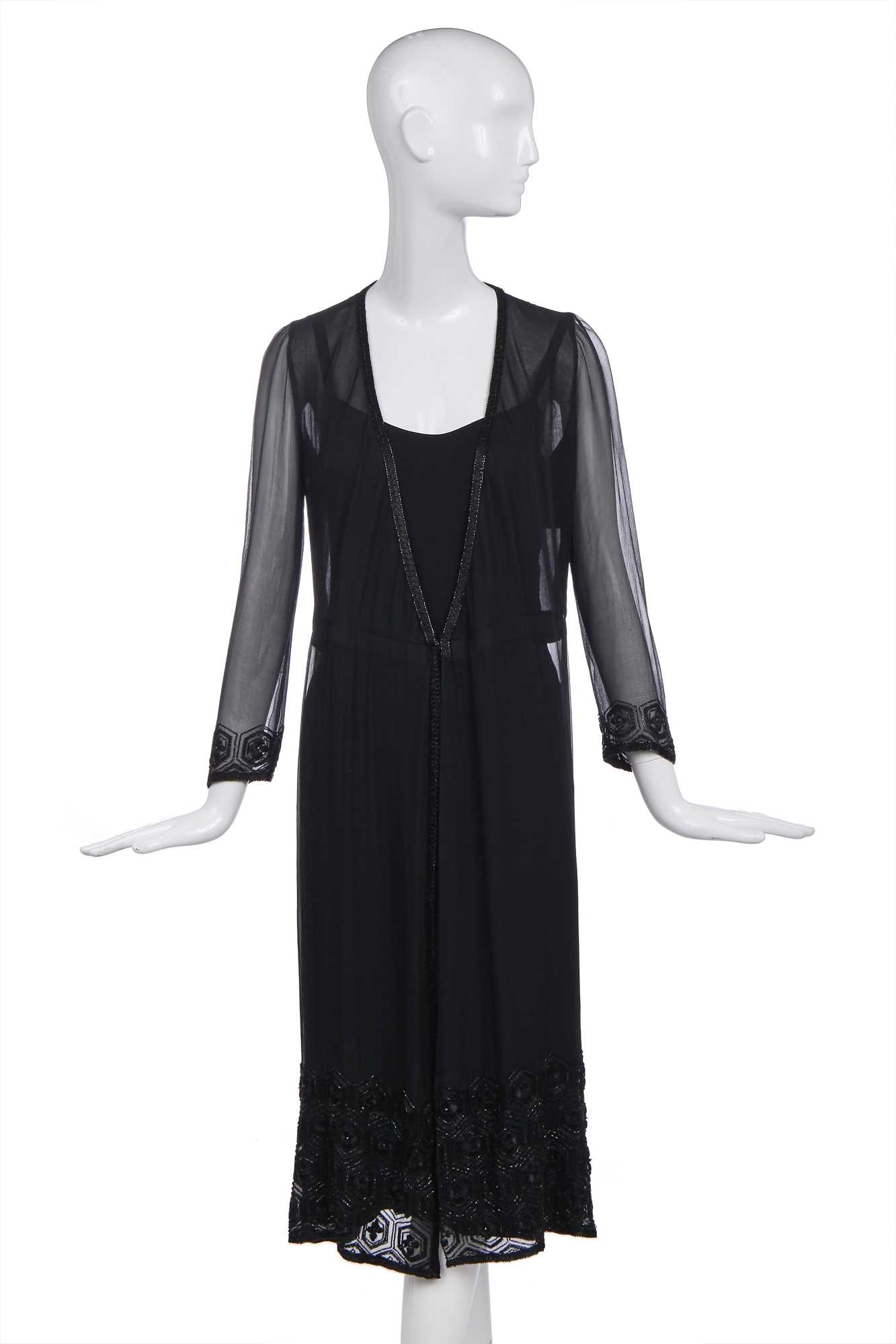 Lot 55 - A Chanel couture little black dress, designed by Jean Cazaubon and Yvonne Dudel, 1975