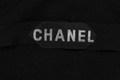 Lot 55 - A Chanel couture little black dress, designed by Jean Cazaubon and Yvonne Dudel, 1975