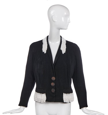 Lot 243 - An Elsa Schiaparelli couture black wool-crêpe jacket, circa 1935