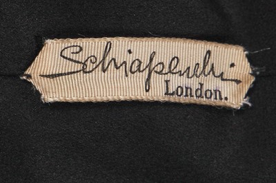 Lot 243 - An Elsa Schiaparelli couture black wool-crêpe jacket, circa 1935
