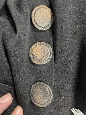 Lot 243 - An Elsa Schiaparelli couture black wool-crêpe jacket, circa 1935