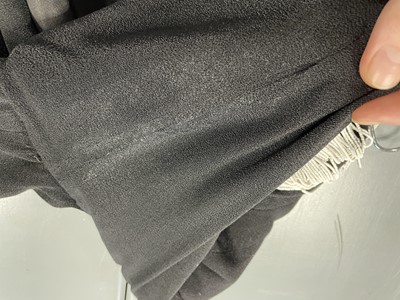 Lot 243 - An Elsa Schiaparelli couture black wool-crêpe jacket, circa 1935