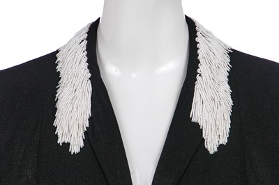 Lot 243 - An Elsa Schiaparelli couture black wool-crêpe jacket, circa 1935