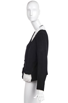 Lot 243 - An Elsa Schiaparelli couture black wool-crêpe jacket, circa 1935