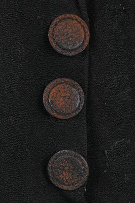 Lot 243 - An Elsa Schiaparelli couture black wool-crêpe jacket, circa 1935
