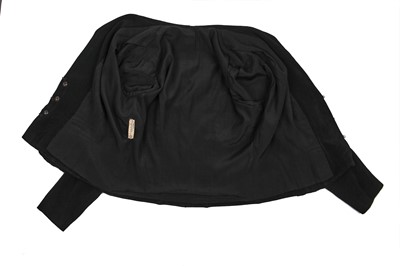 Lot 243 - An Elsa Schiaparelli couture black wool-crêpe jacket, circa 1935