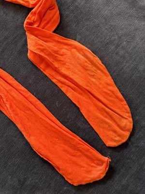 Lot 13 - A Westwood/McLaren orange toga dress and bra, 'Nostalgia of Mud' (Buffalo) collection, Autumn-Winter, 1982-3