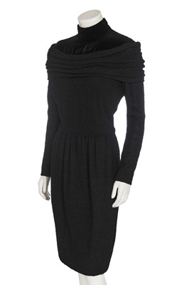 Lot 382 - A Pierre Balmain couture black bouclé wool dress, late 1950s-early 1960s