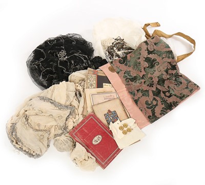Lot 264 - A group of dress trimmings and beaded remnants,...
