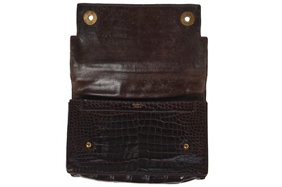 Lot 58 - An Hermès dark brown `Piano' crocodile bag, 1960s
