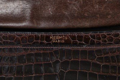 Lot 58 - An Hermès dark brown `Piano' crocodile bag, 1960s