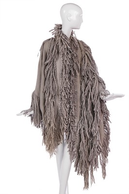 Lot 527 - An Issey Miyake fringed grey wool coat, Autumn-Winter, 1985-86