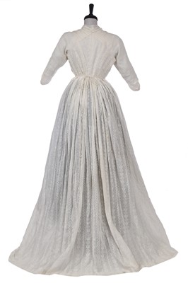 Lot 212 - A rare woven muslin round gown, circa 1795