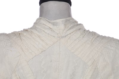 Lot 212 - A rare woven muslin round gown, circa 1795