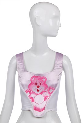 Lot 490 - A Vivienne Westwood 'Care Bear' pale-pink satin corset, 2000