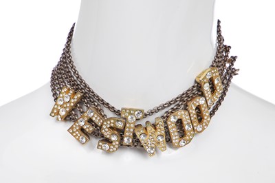 Lot 452 - A Vivienne Westwood choker and long clip-on earrings, 'Always on Camera' collection, autumn-winter 1992-93