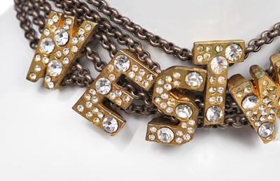 Lot 452 - A Vivienne Westwood choker and long clip-on earrings, 'Always on Camera' collection, autumn-winter 1992-93
