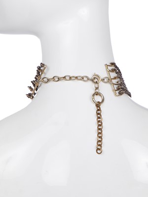 Lot 452 - A Vivienne Westwood choker and long clip-on earrings, 'Always on Camera' collection, autumn-winter 1992-93