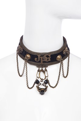 Lot 428 - A Jean Paul Gaultier brass and velvet choker, 1990s